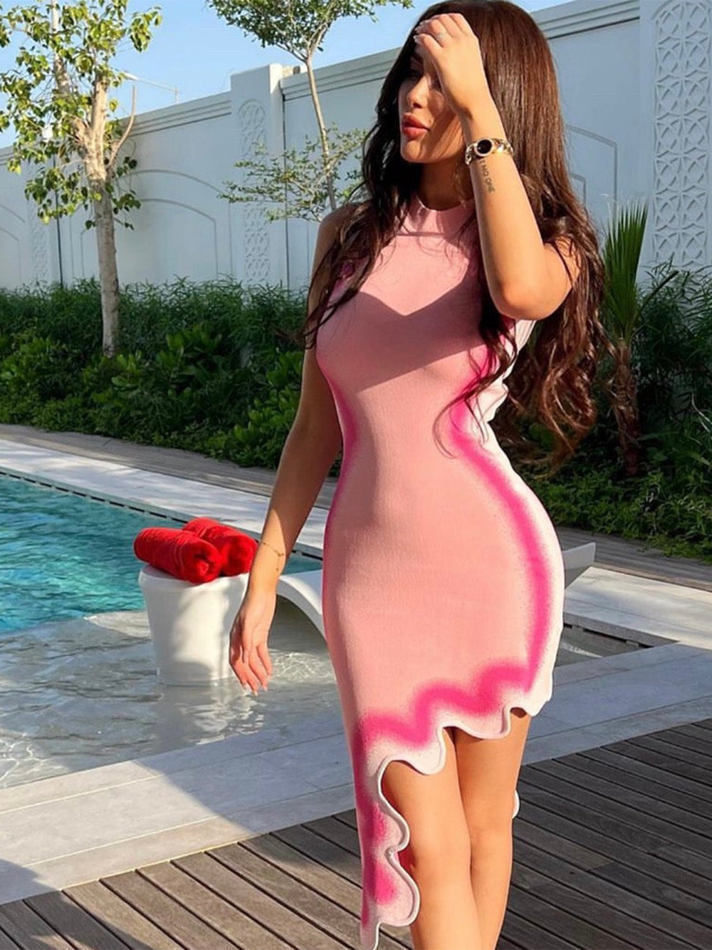 Giulia - Vestido largo de punto sin mangas con borde ondulado irregular