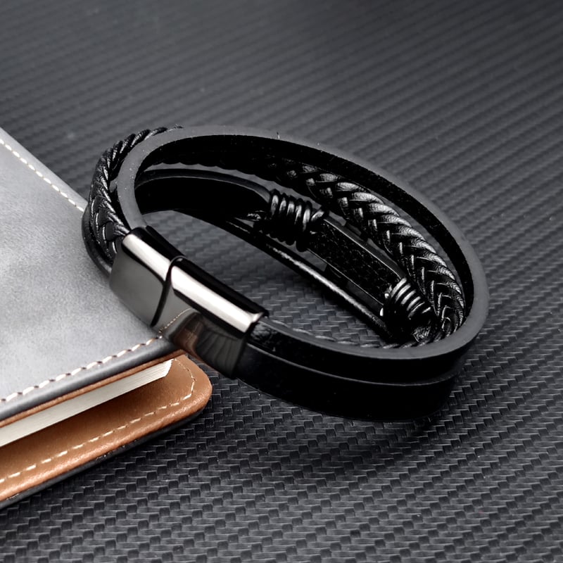 Pulsera hombre cuero trenzado con cruz acero - Sentinel