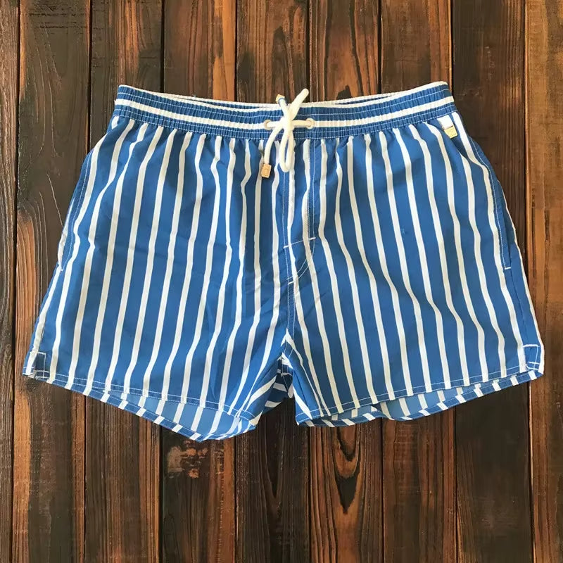 Bañador hombre corto rayas verticales azul y blanco - Oceanix