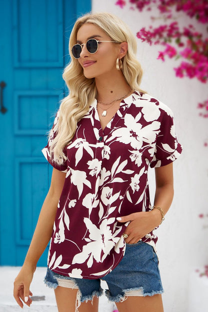 Daris - Blusa floral con cuello de muesca