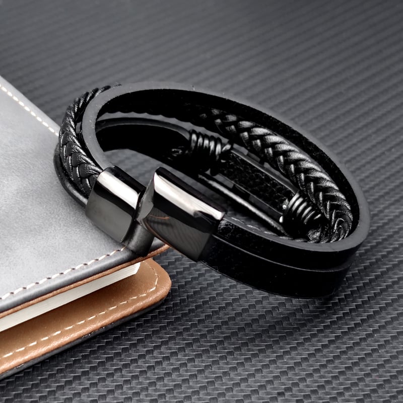 Pulsera hombre cuero trenzado con cruz acero - Sentinel