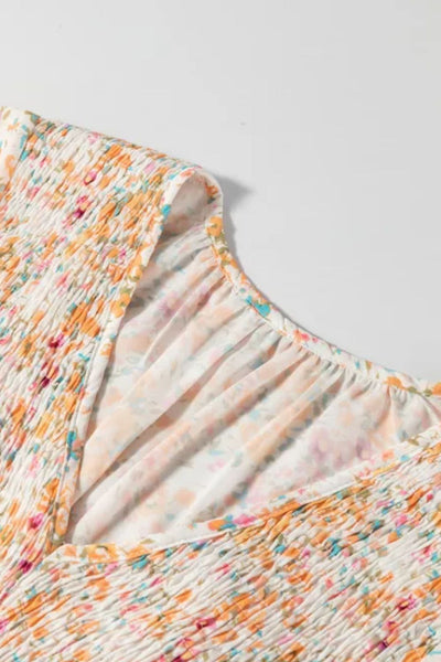 Arielle - Minivestido estampado con escote en V y mangas globo