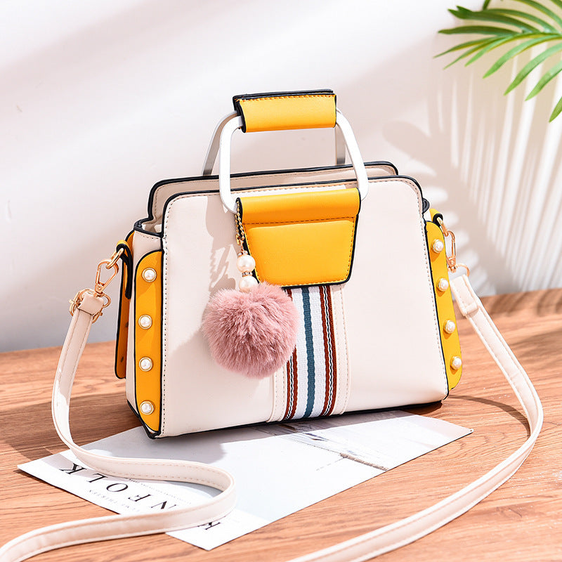 Bolso de mano con detalles modernos – Fiorella