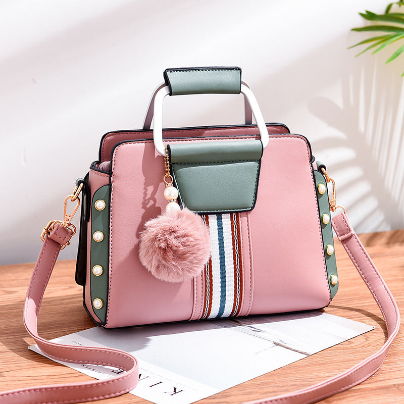 Bolso de mano con detalles modernos – Fiorella