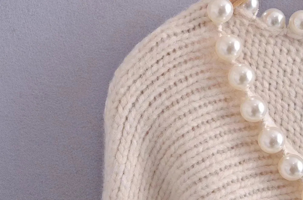 Angèle - Jersey chic y desenfadado con perlas de imitación