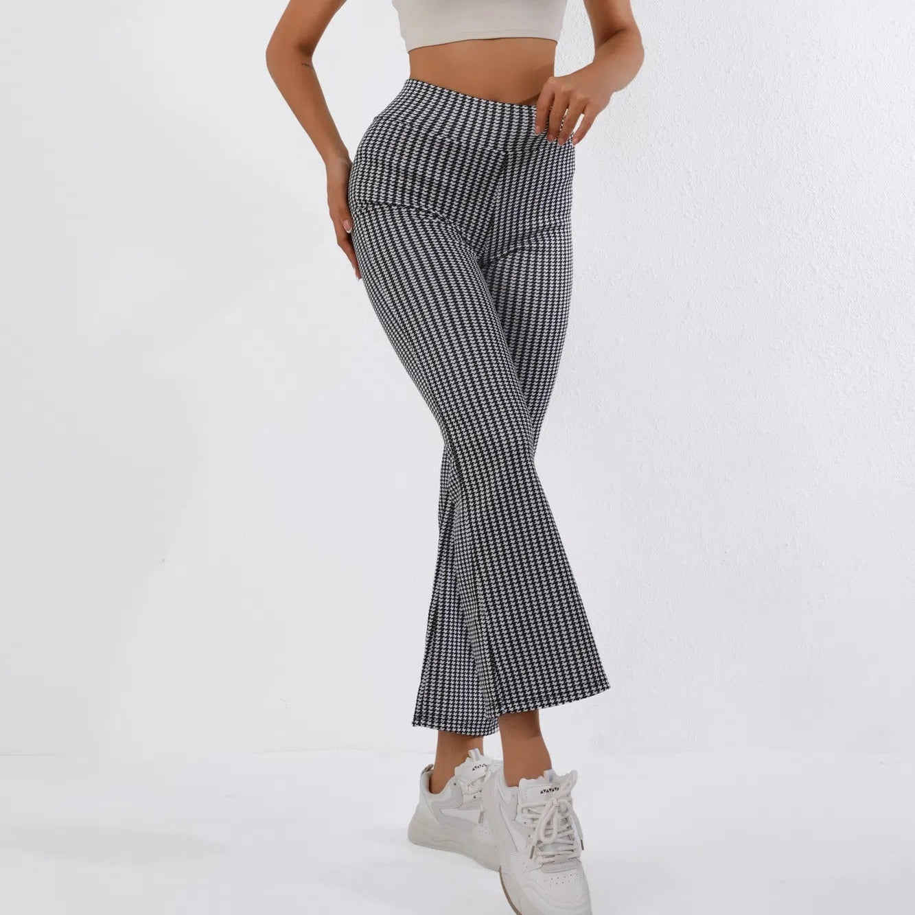 Pantalón acampanado para mujer de tejido elástico con estampado clásico - Renata