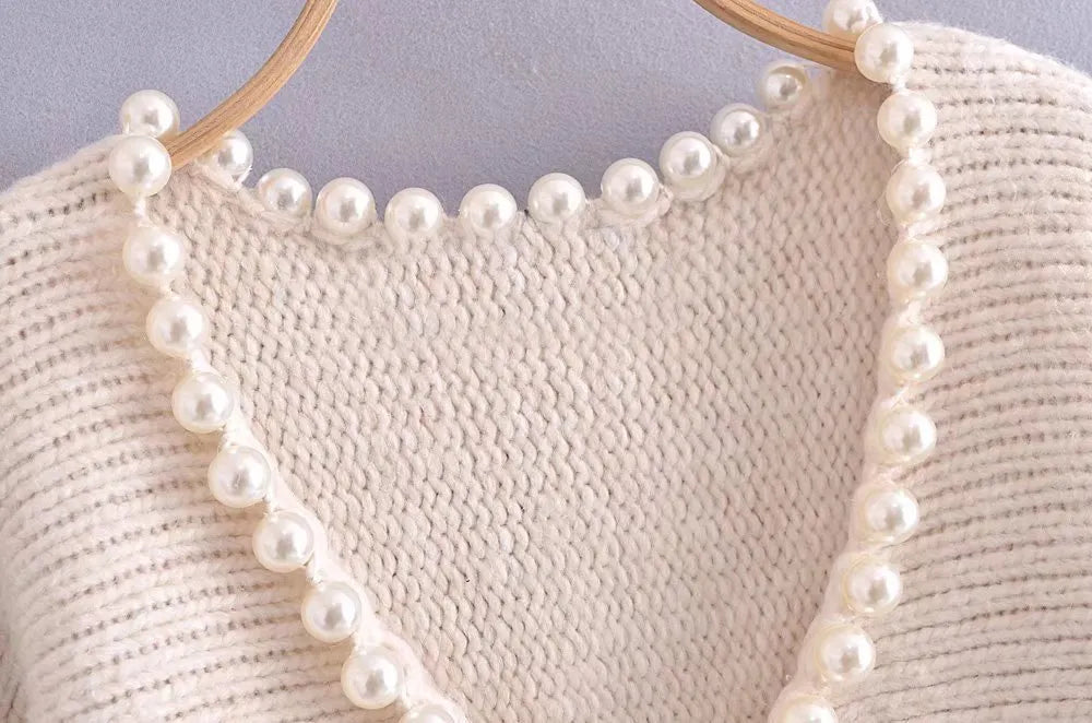 Angèle - Jersey chic y desenfadado con perlas de imitación