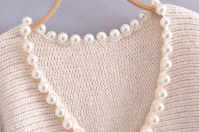 Angèle - Jersey chic y desenfadado con perlas de imitación