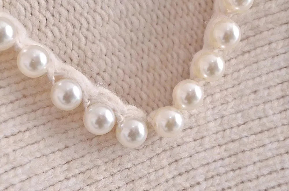 Angèle - Jersey chic y desenfadado con perlas de imitación