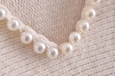 Angèle - Jersey chic y desenfadado con perlas de imitación