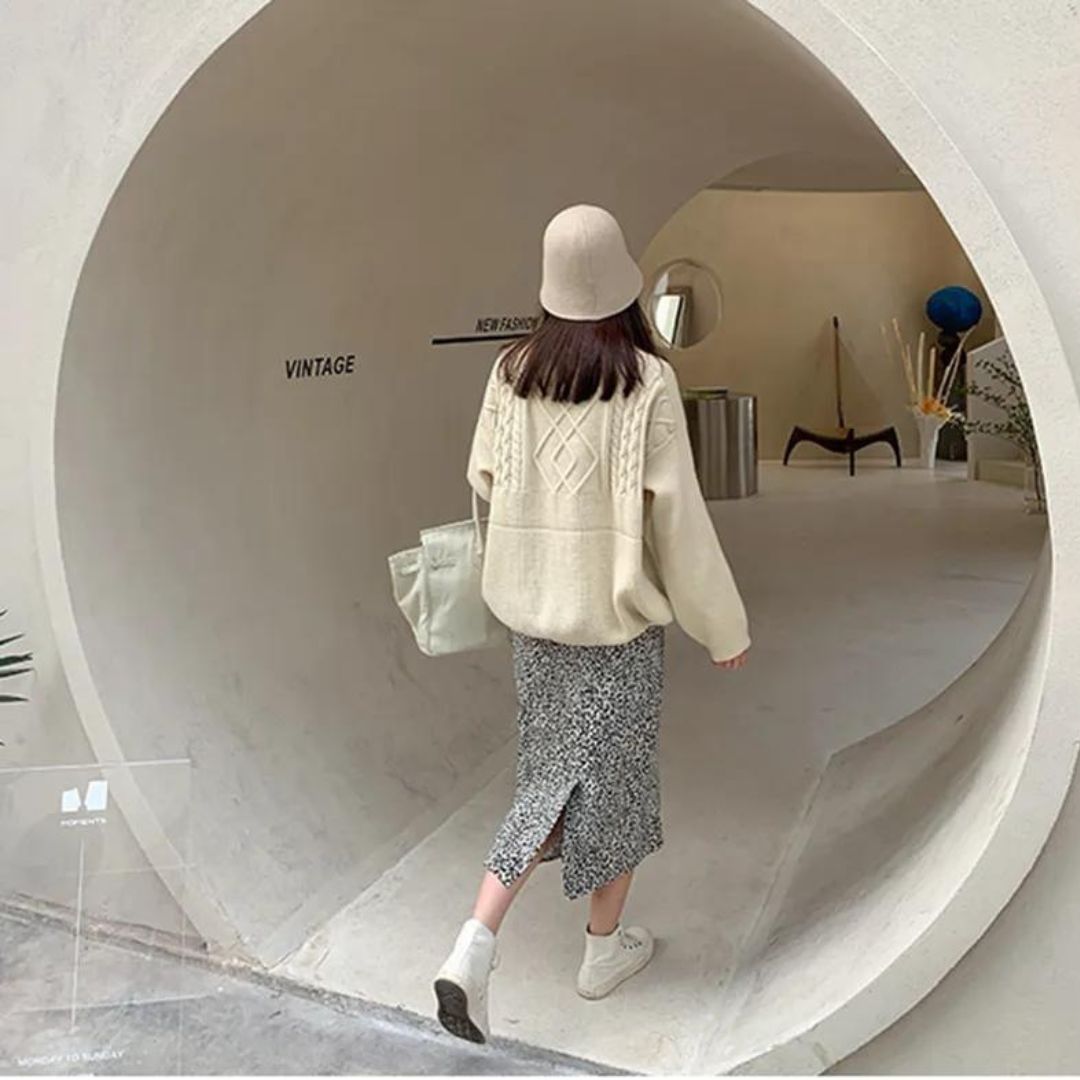 Hanna - Jersey de cuello alto con diseño geométrico de punto trenzado