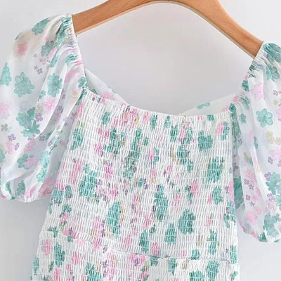 Fioby - Minivestido de volantes florales con mangas abullonadas