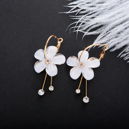 Pendientes flor lila