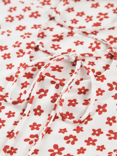 Emma - Vestido cruzado sin tirantes con estampado floral fluido