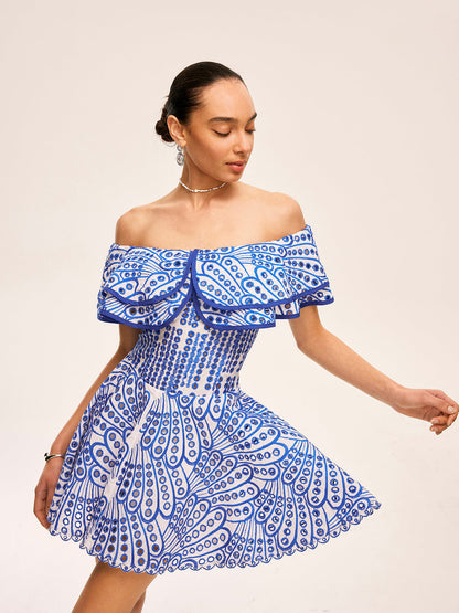 Hanna - Vestido semi transparente con volantes y hombros descubiertos