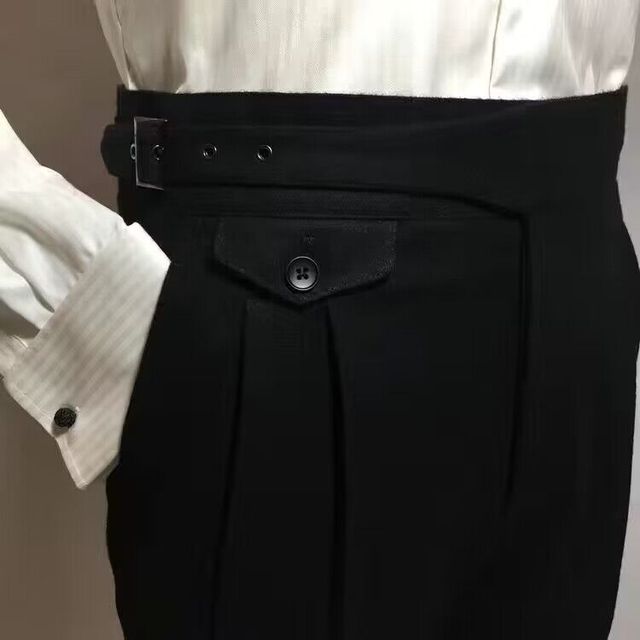 Elegantes pantalones de lana con cinturón para hombre