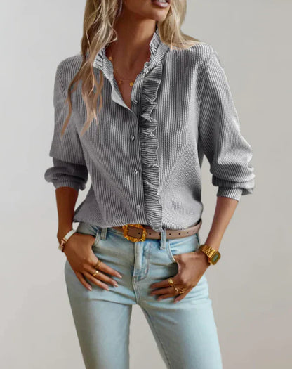 Ciara - Elegante blusa de manga larga y volantes