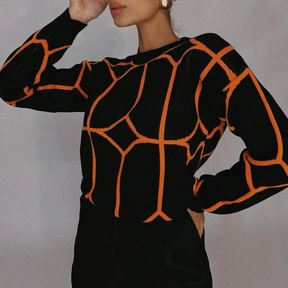 Chio - Jersey geométrico de cuello redondo y estampado llamativo