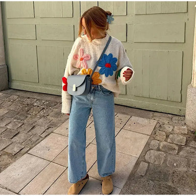 Farah - Jersey de punto grueso con llamativos apliques florales