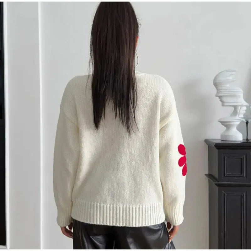 Farah - Jersey de punto grueso con llamativos apliques florales