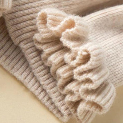 Lilia - Jersey de cuello alto de canalé con cuello de volantes