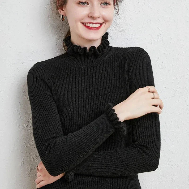 Lilia - Jersey de cuello alto de canalé con cuello de volantes