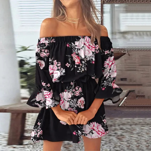 Amalina - Elegante vestido sin hombros con estampado floral