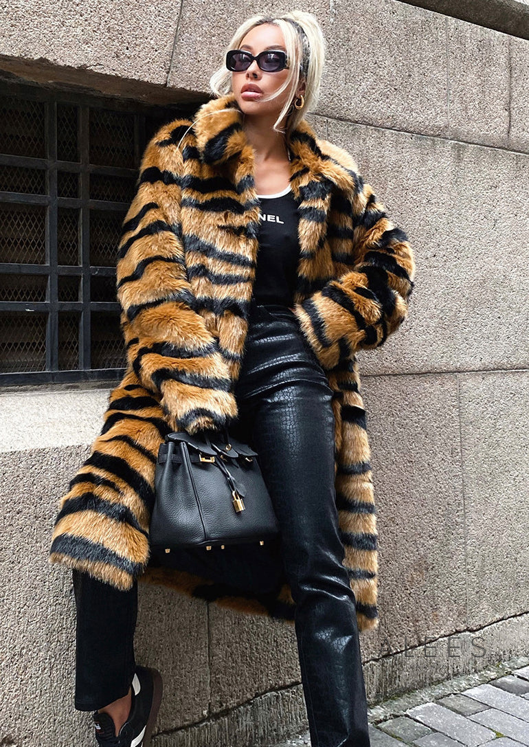 Abrigo largo de mujer efecto piel sintética con estampado animal - Brisa