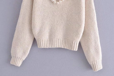 Angèle - Jersey chic y desenfadado con perlas de imitación