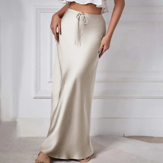 Falda de satén de talle alto con lazos, elegante y actual perfecta para un look sofisticado y moderno