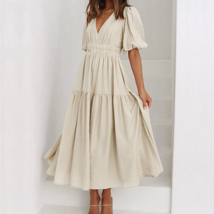 Kelly - Vestido estilo elegante con escote en V y mangas abullonadas