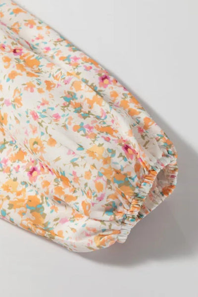 Arielle - Minivestido estampado con escote en V y mangas globo