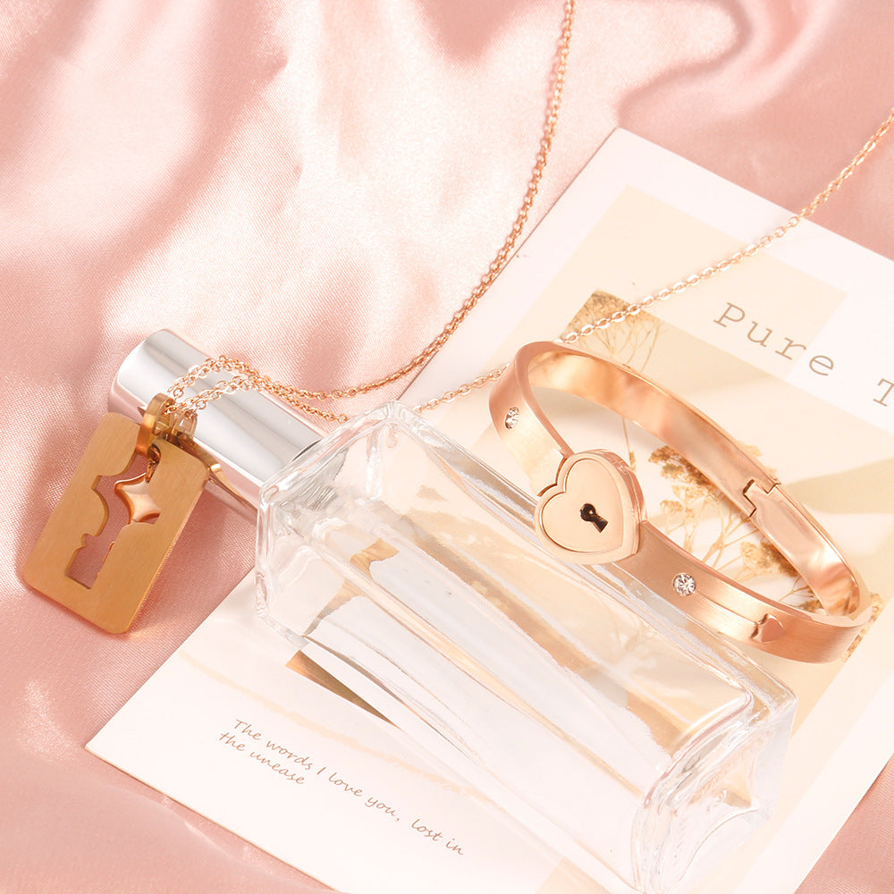 Set joyería pareja candado y llave diseño corazón - Énclave