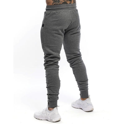 Pantalones deportivos para hombre tejido técnico estilo ajustado - Finn