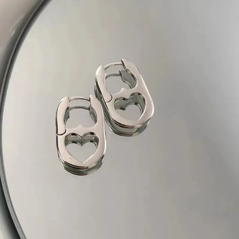 Aretes con corazón de acero inoxidable
